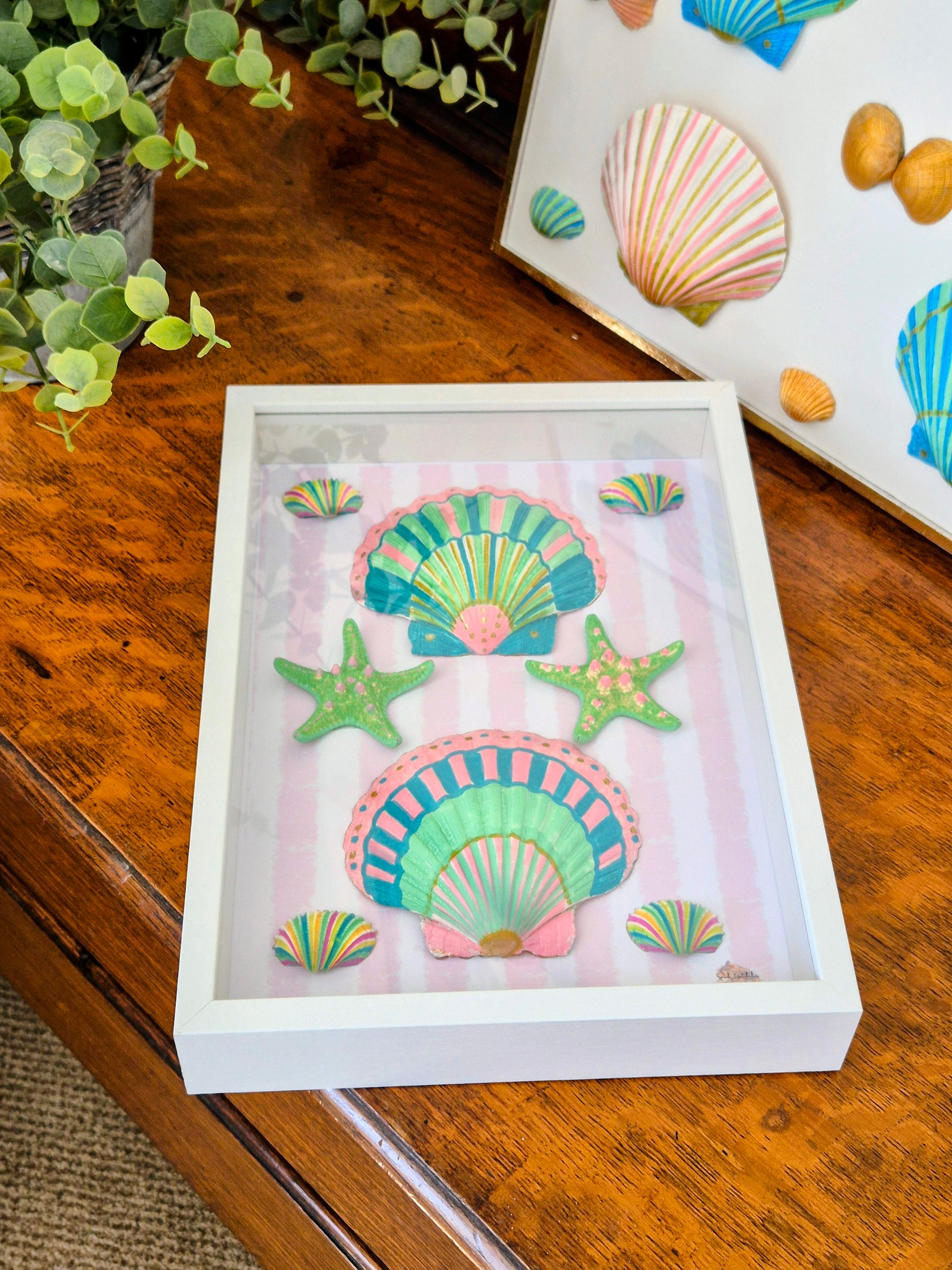 Full view of Candy Beach Days original shell art with candy pink stripe background and ice cream coloured shells